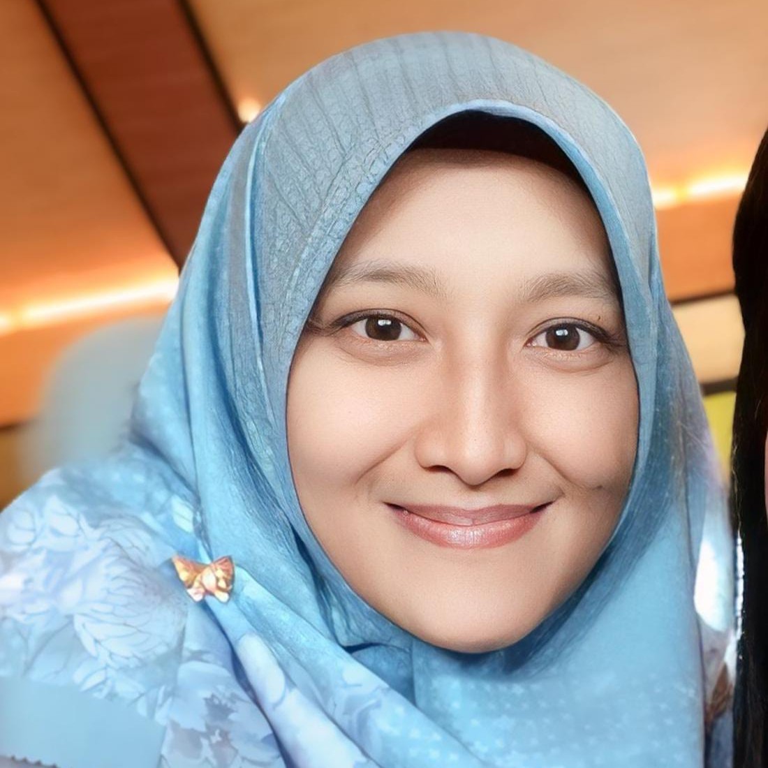 Evi Nia Azizah, S.Si